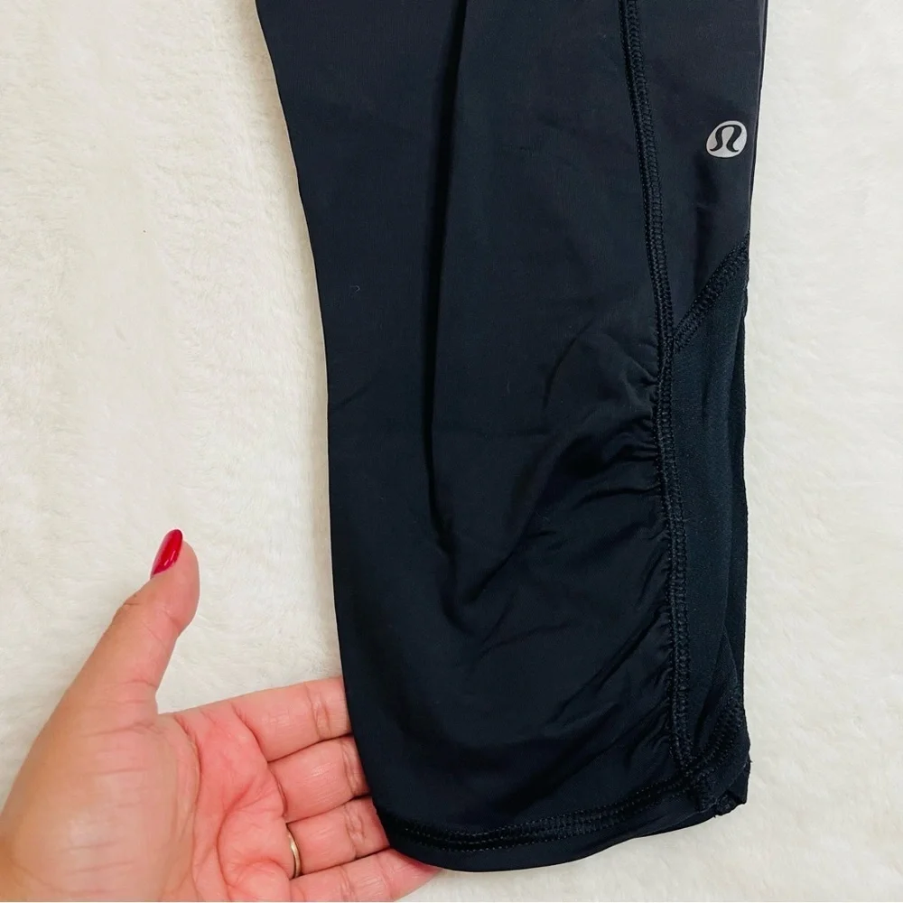 lululemon Cropped Black and Pink Floral Waistband Leggings